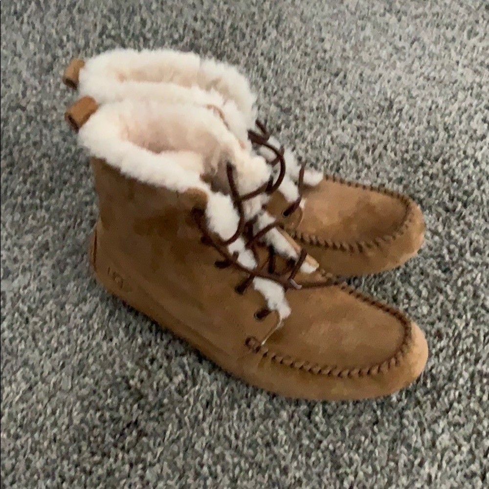 Women’s Ugg moccasins size 9. Never worn.